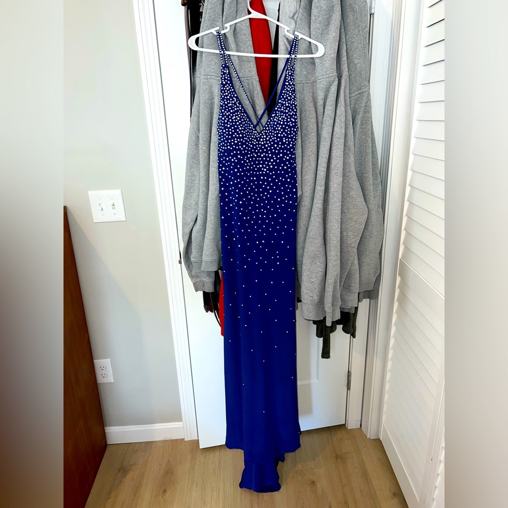 Form fitting sparkly royal blue prom dress